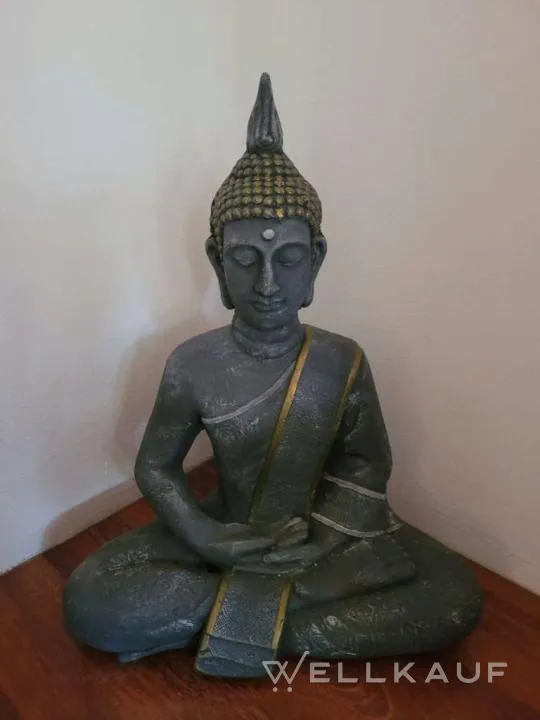 Indische Figur sitzend