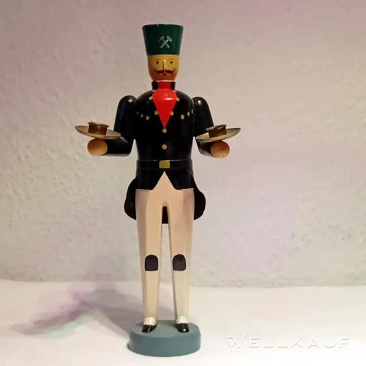 Bergmann als Kerzenhalter