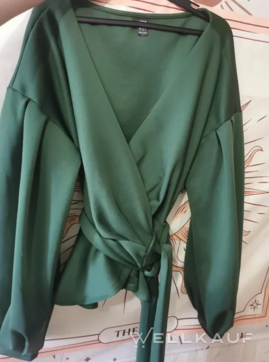 Bluse mit Schößchen