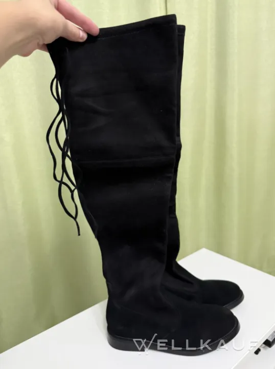 Oberschenkelhohe Stiefel