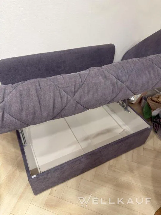 Gebrauchtes graues Sofa